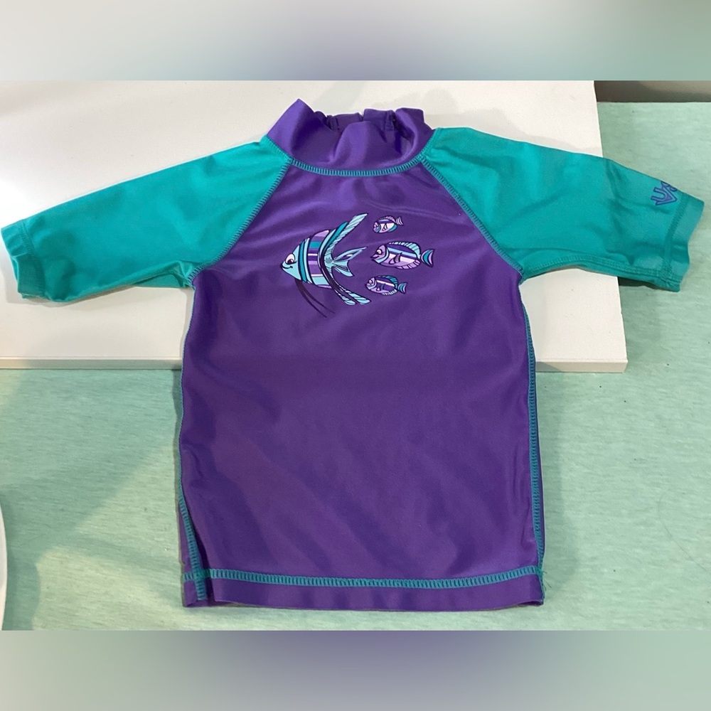 UV Skinz swim top. Size 2T